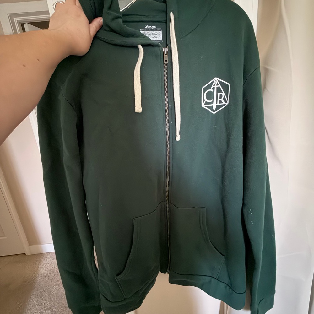 Critical Role Traveler Con Dark Green Zip-Up Hoodie with White Crest Logo